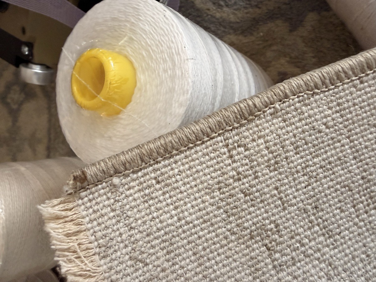 Binding yarn spools in the My Way Carpet shop