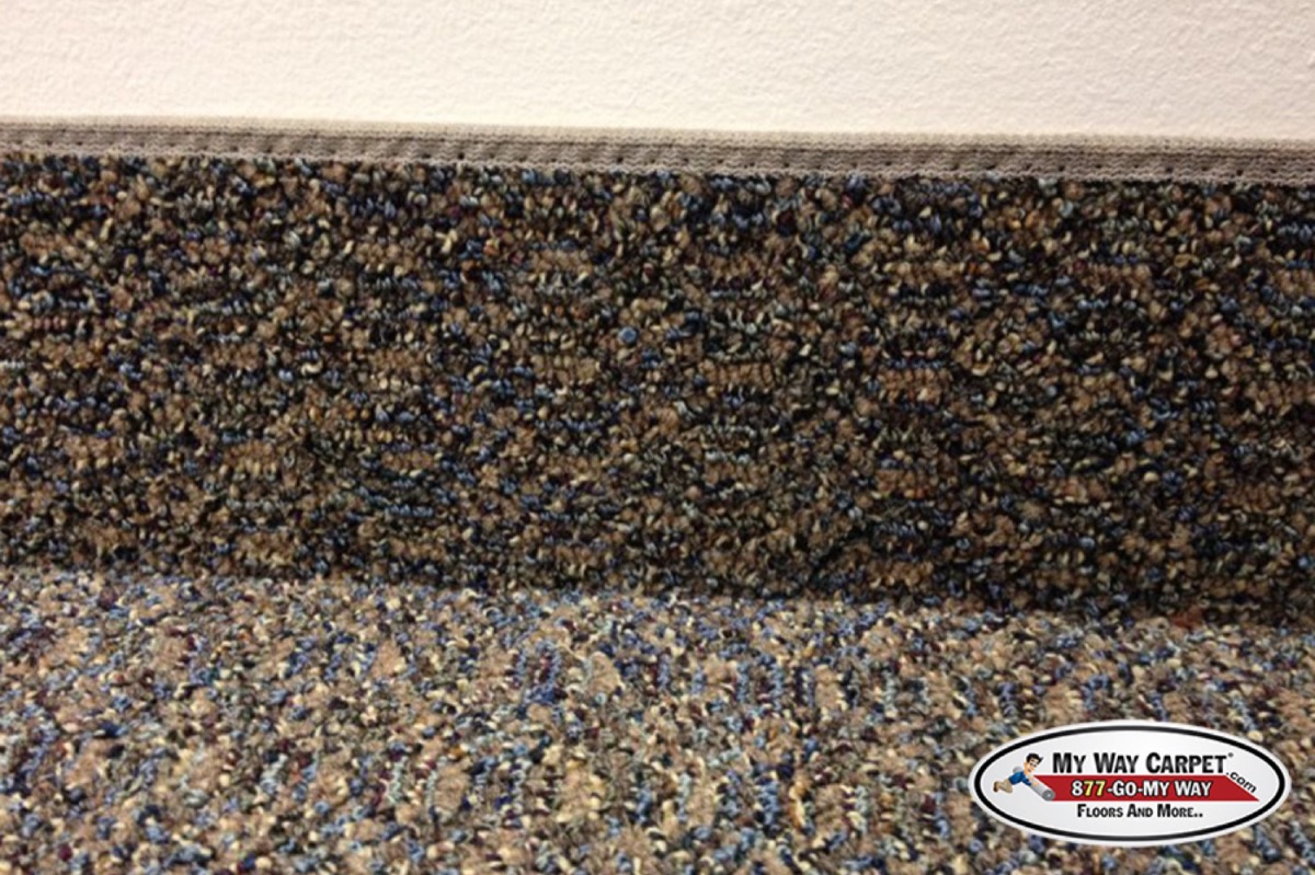 Custom bound carpet wall base