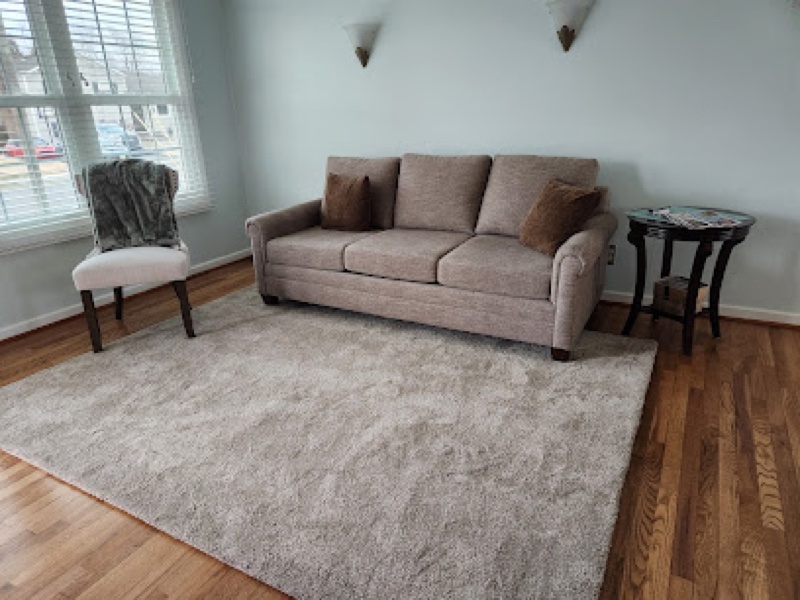 Custom bound area rug in a living room